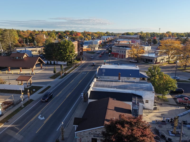 Downtown Caro autumn aerial — street-level angle